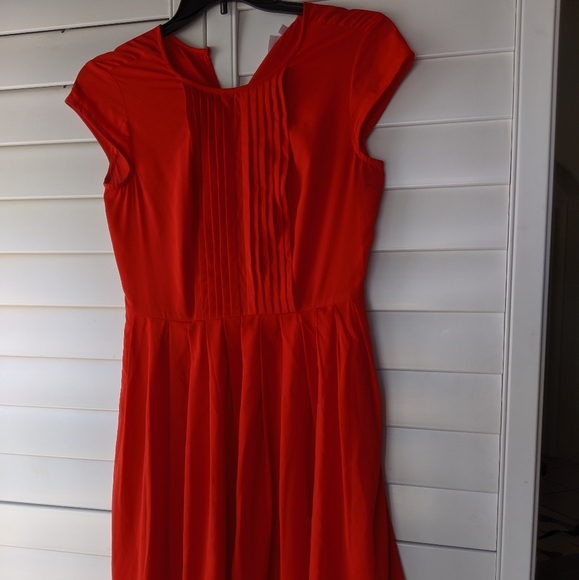 red pleated midi dress
